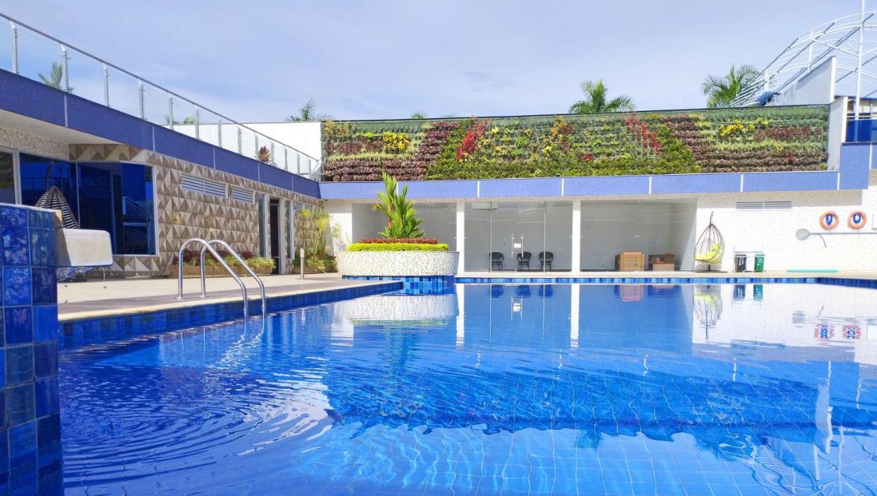 קאלי Hotel Royal Elim International מראה חיצוני תמונה The swimming pool at the hotel