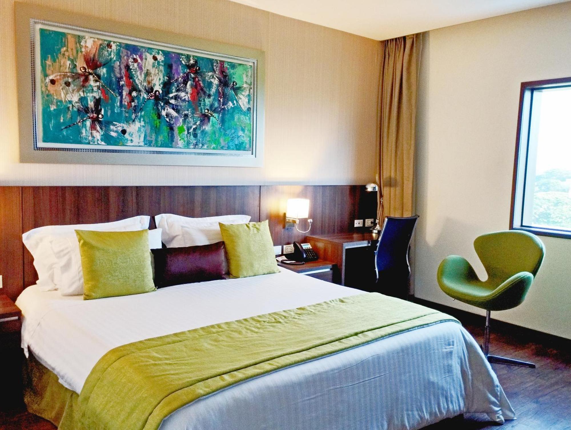 קאלי Hotel Royal Elim International מראה חיצוני תמונה A room at the hotel